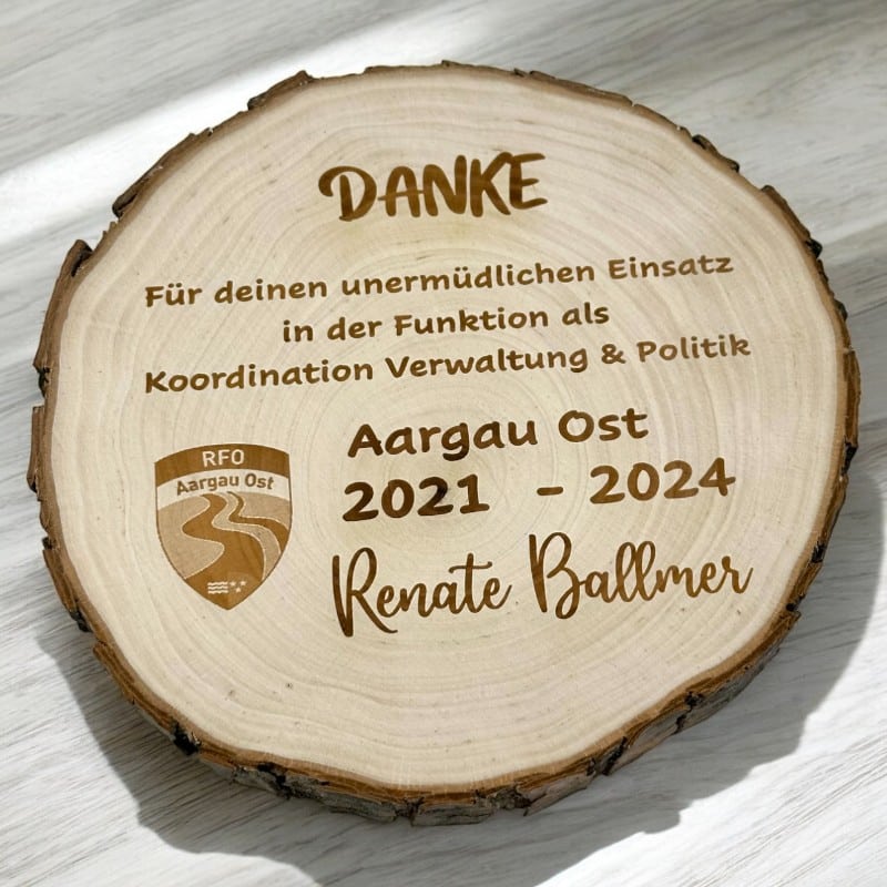 Baumscheibe als Anerkennung